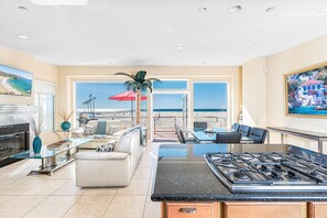 The main living area is located on the second floor and features an open floor plan for easy group hangouts.
                