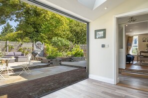 The Clockhouse, North Lopham: Bi fold doors to the enclosed patio