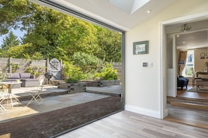 The Clockhouse, North Lopham: Bi fold doors to the enclosed patio