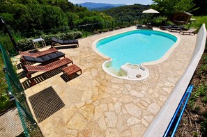 Heated swimming pool, with children's security fence and bathroom facilities