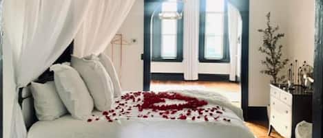 Plush romantic King size bed.