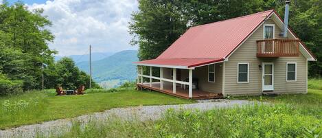 Cabin exterior - Beautiful views down the valley from the fire pit & porch.