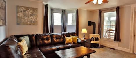 Spacious living room with 50" TV and a sectional with plenty of seating! 