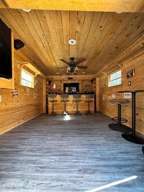Custom bar w/ smart TV, surround sound & disco lighting for some extra fun!
