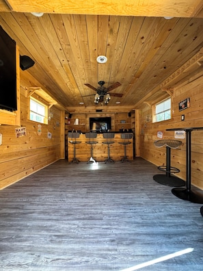 Custom bar w/ smart TV, surround sound & disco lighting for some extra fun!