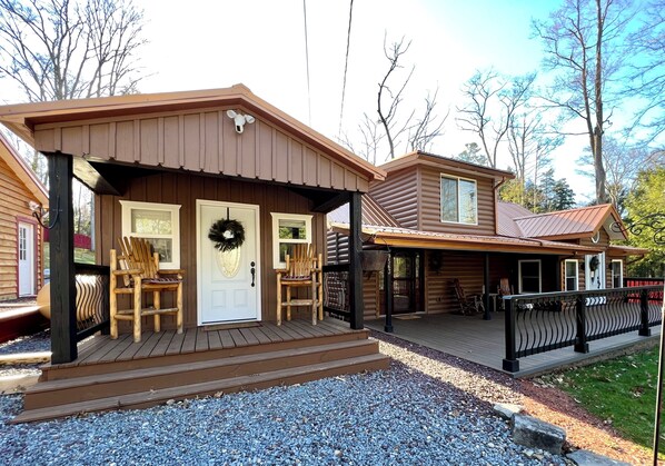 Front view of CKL & Game shed w/ front porch Rustic sitting area