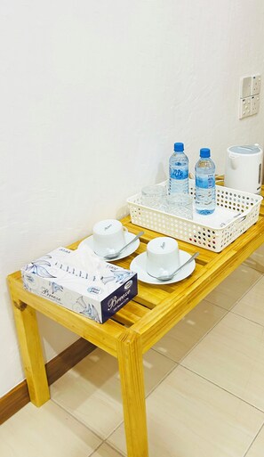 Room Amenities, Minibar, Kettle , coffee & water cup , Free Coffee ,Tea & water.