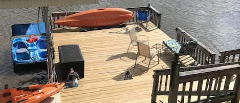 Dock with boats & seating.