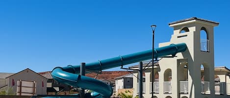 Community Water Park with water slide, lazy river, splash pad and 2 hot tubs