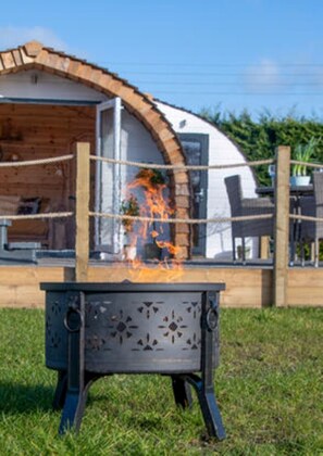 The fire pit outside Chaplins Club. Logs are supplied during your stay.