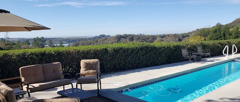 Soak up the California sun lounging in this private 33 foot lap pool. 