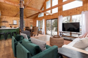 Tons of natural light exposed wooden beams delight