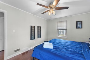 Pillow top King Bed With Fan and End Tables