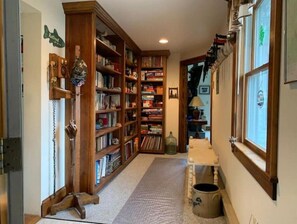 Side entrance hallway. Lots of space to hang coats.