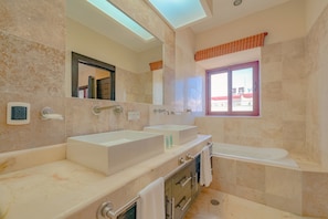 Bathroom with tub and shower