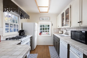 Kitchen is light and bright with everything you need