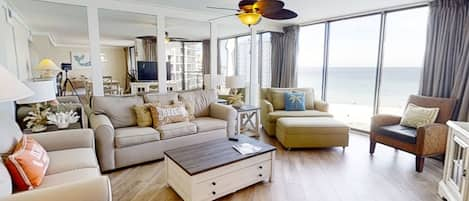 Living Room with beautiful views of the resort and beach below.