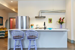 Open kitchen allows for the whole group to cook together.