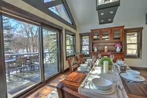 Open living area with indoor and outdoor dining