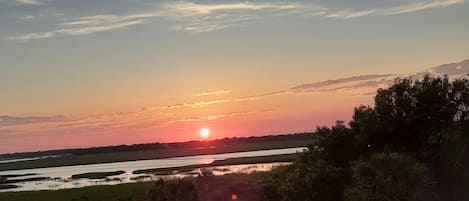 Sunset view from balcony in July.