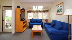 Living room, with door to the back patio 