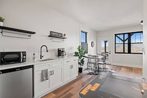 Relax in the Gameroom, Lounge and enjoy a cup of Joe in the Kitchenette area! Hot tub and Queen Bedroom suite, all here on the lower level!