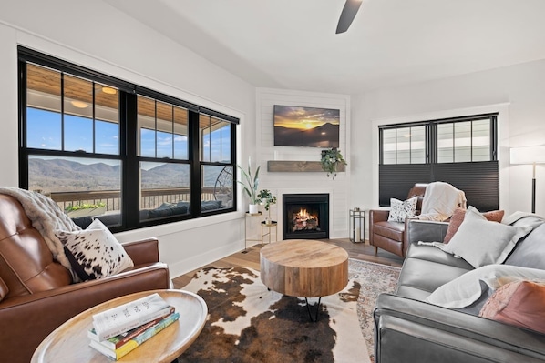 Main living area with spectacular views from the 10 x 20 Deck. Open living space including kitchen, grilling deck and dining area.
