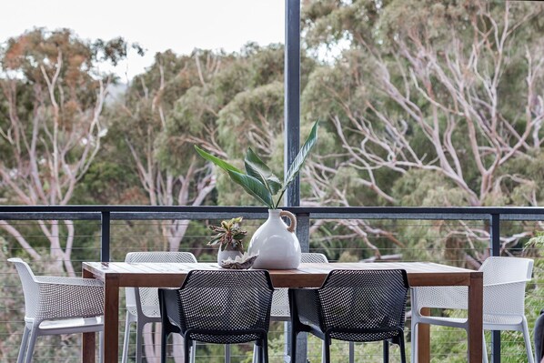 Relax and unwind on the deck in the tree tops