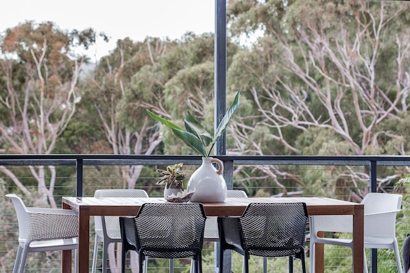 Relax and unwind on the deck in the tree tops