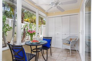 Screened patio off the living room with a full size washer/dryer in the closet