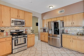 A fully appointed kitchen is offered for you