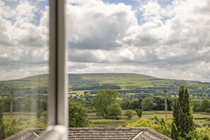 First floor: Master bedroom with views towards Penhill