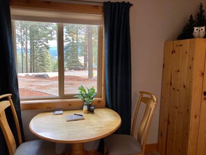 Gorgeous sunrise lake views OR blackout curtains to sleep in late. ;-) Small hanging wardrobe.