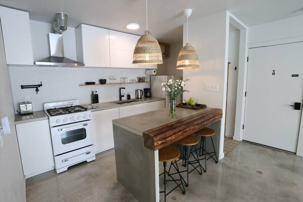 Everything you need, right where you need it—from a full kitchen to a welcoming entryway.
