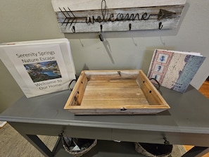 Welcome Table, Welcome book with house information, guest book,