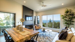 Dining an living room ocean views at hyams beach accommodation
