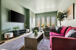 The living room has a pullout couch for additional sleeping space