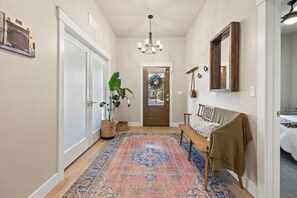 Welcome in.  Private office on the left with guest bed on the right