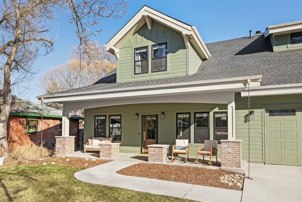 Welcoming front porch perfect for relaxing and taking in the beautiful sunsets