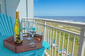 Enjoy wine or a cup of coffee on your private oceanfront balcony