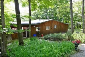 back of the cottage from the parking area choice of stone steps or sloped path 