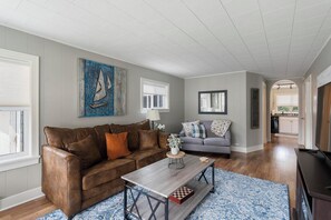 Living room - Sleeper sofa in the den with love seat and two oversized chairs.  Flat screen