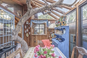 Enclosed Sun Porch with Live Tree