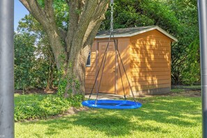 Stare at the sky, read a book or spin till your dizzy. The kids and adults will love the round swing!