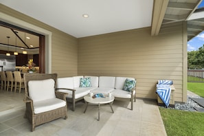 Covered Lanai with additional seating, a perfect spot for your morning coffee.