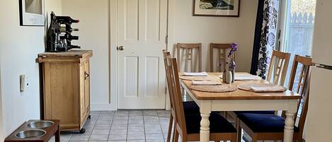 Dining Area for 6  through the sliding glass door is the back deck.