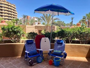 Beach chairs, umbrellas, boogie boards, toys, & towels are all available for your use. (1)