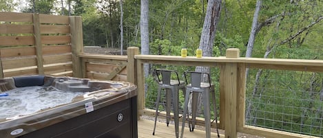 Relax in this 5 person hot tub while enjoying the views!