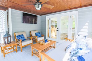 You'll swoon over this comfortable screened porch located off of the kitchen & dining area.