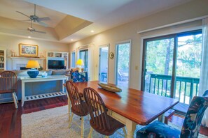 The living room and dining room look out onto the lagoon situated behind the house.